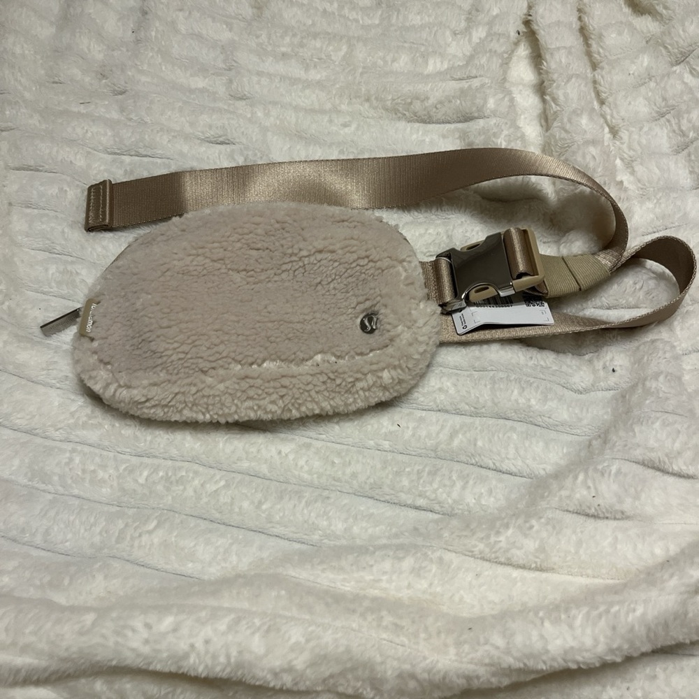 brand newf fleece everywhere belt bag still has tags